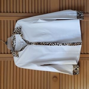 Chico's white blouse with contrasting leopard trim collar, placket, and cuffs.